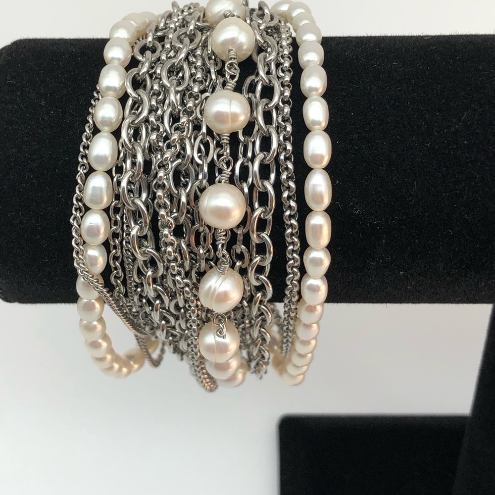 Multi chain Stainless Steel and real pearl bracelet.